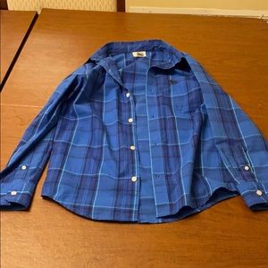 Blue buttoned down collared long sleeve shirt